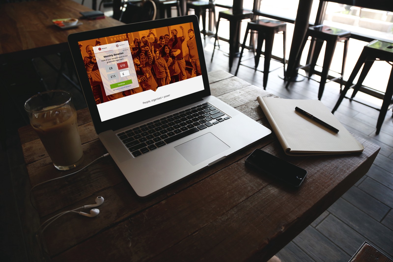 ACORN's monthly donation page on SmartRaise, shown on a laptop